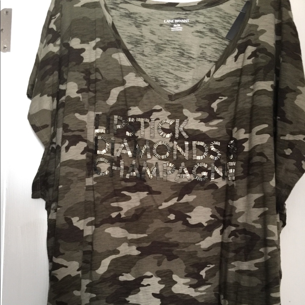 Plus size 26w/28w.  Camo printed Tee embellishment